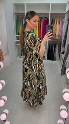 Oliva Abstract Print V Neck Magic Maxi Dress