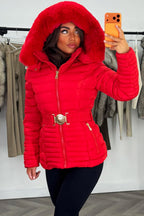 Red Puffer Jacket With Faux Fur Hood And Gold Belt